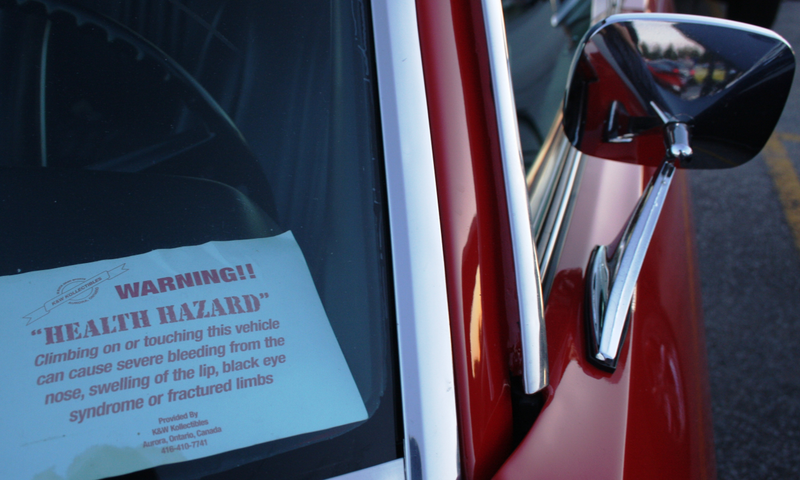 Illustration for article titled A Series of Increasingly Aggressive "Don’t Touch My Car" Warning Signs